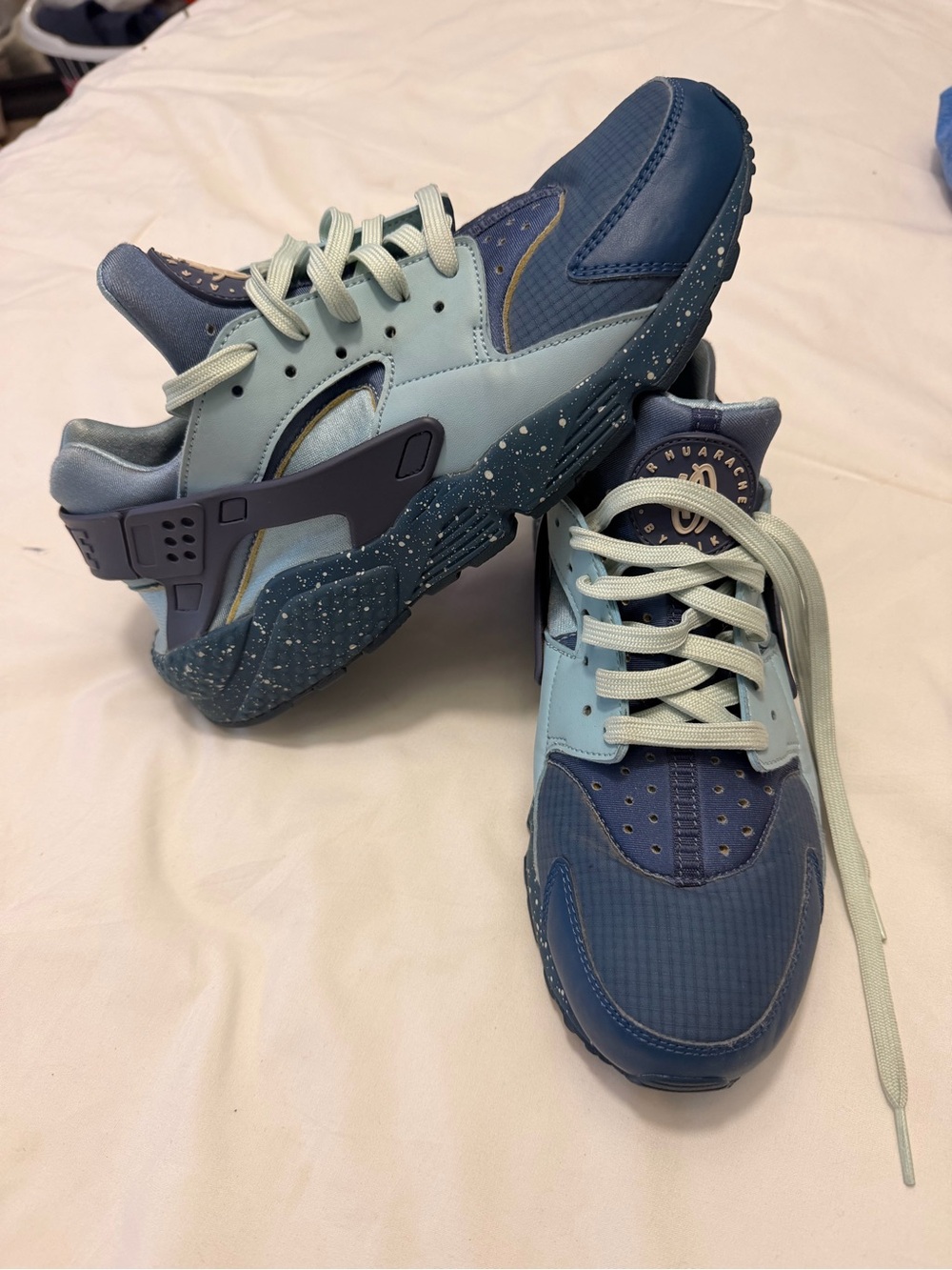 Nike Woman’s Navy and Light Blue Speckled Sole Sneakers